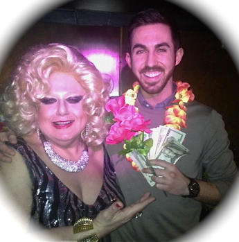 TUESDAYS AT CIBAR LOUNGE Latest big winner poses with cash, floral trimmings and Sultana!